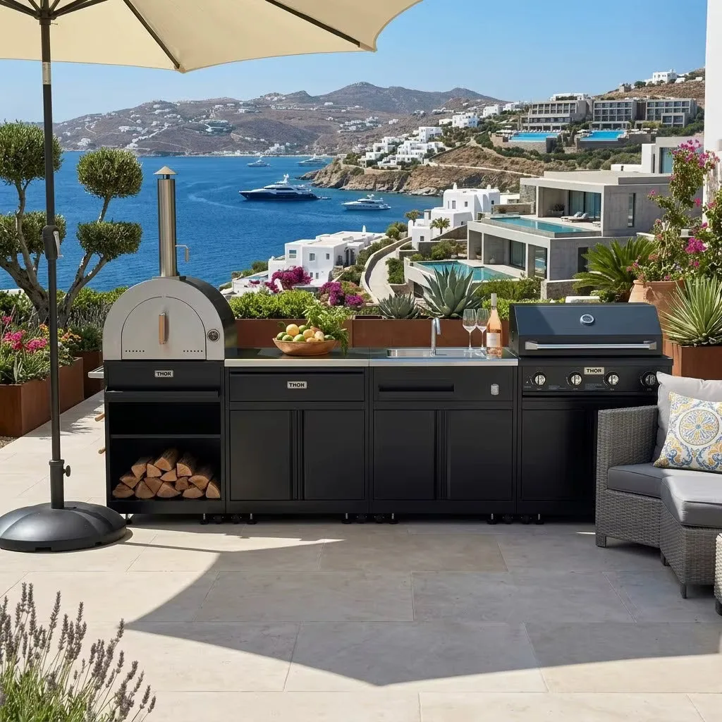 THOR Kitchen outdoor kitchen island on a terrace with a sea view
